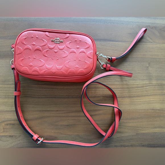 Coach Handbags - Coach Coral/Orange Crossbody or Wristlet Bag. 2 zipped compartments. Authentic.